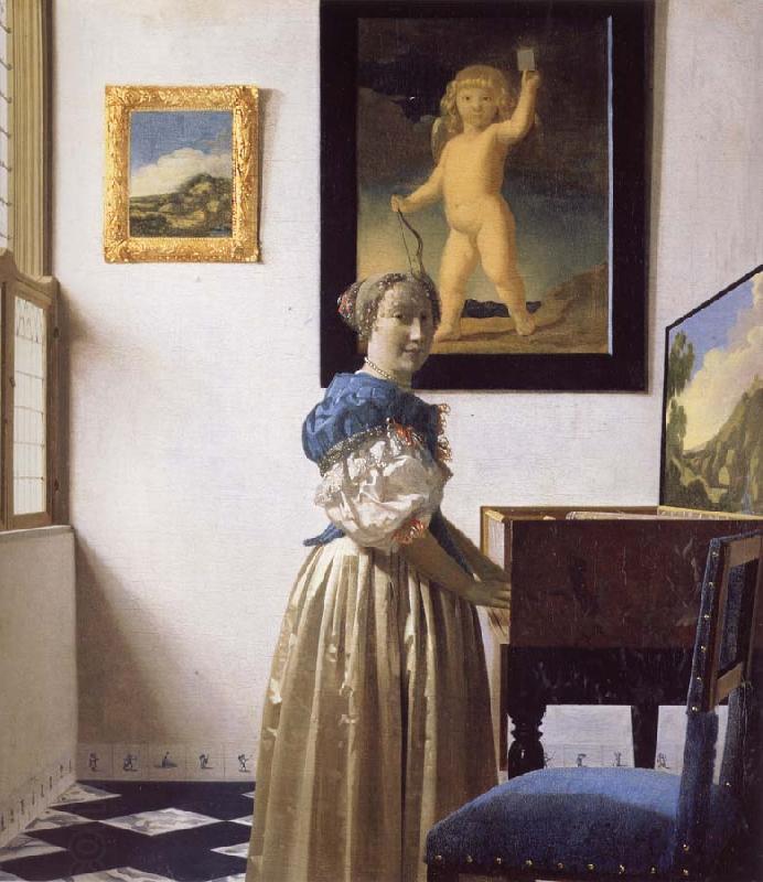 JanVermeer A Young Woman Standing at a Virginal China oil painting art
